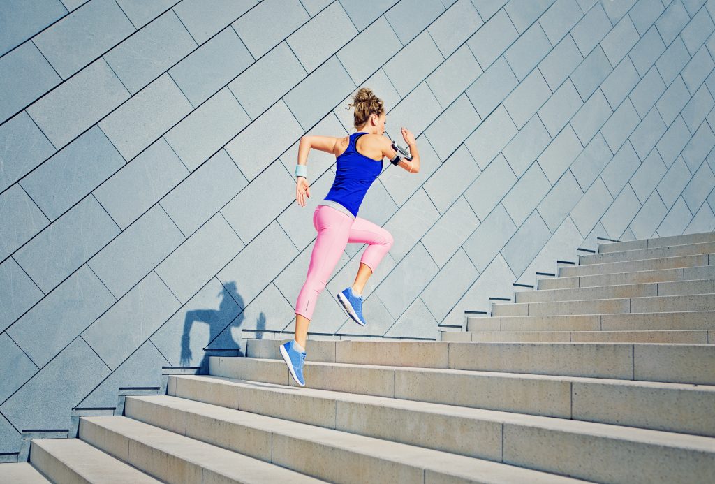 woman running up stairs in activewear iStock 825721894 podcast