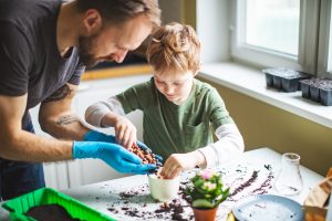 Property Advocacy for Doctors in Training 11 Father and son spending time together with plants iStock 1137930766 buyers advocate for doctors