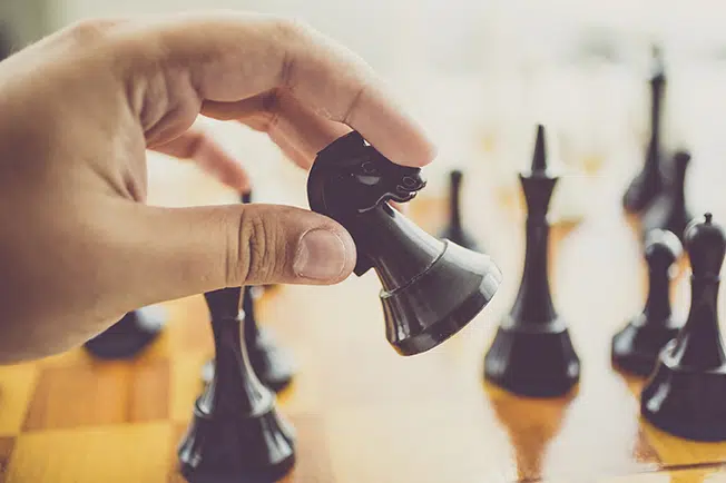 Our story 12 playing chess iStock 000068662325web doquile perrett meade