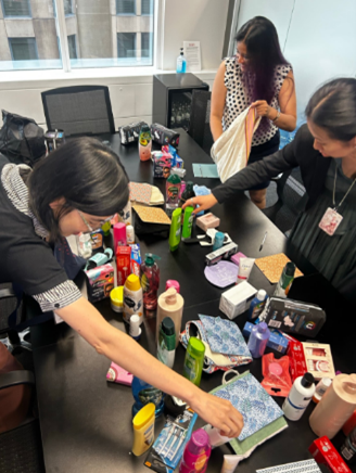 DPM employees helping pack boxes