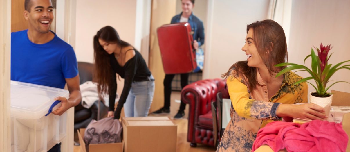 Young-friends-moving-in-iStock-497390216-1