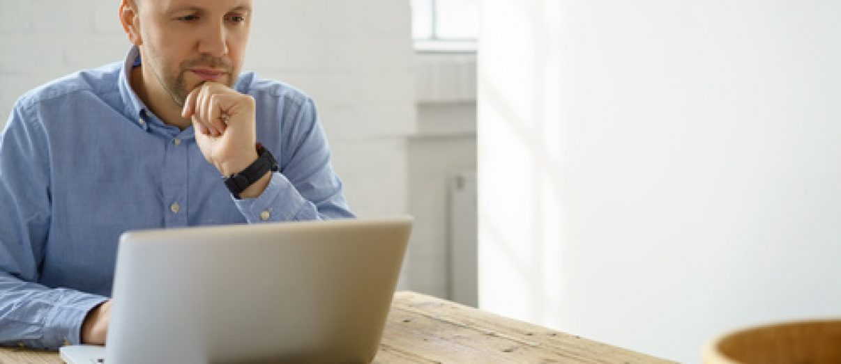 man doing work on laptop