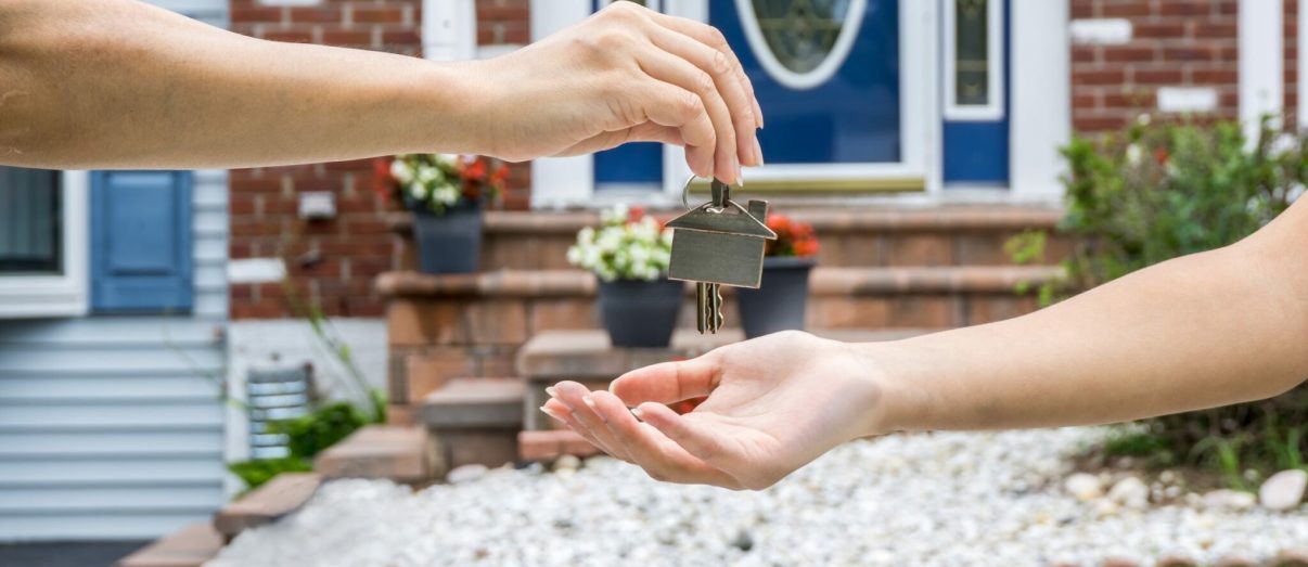 Handing Over the Key from a New Home