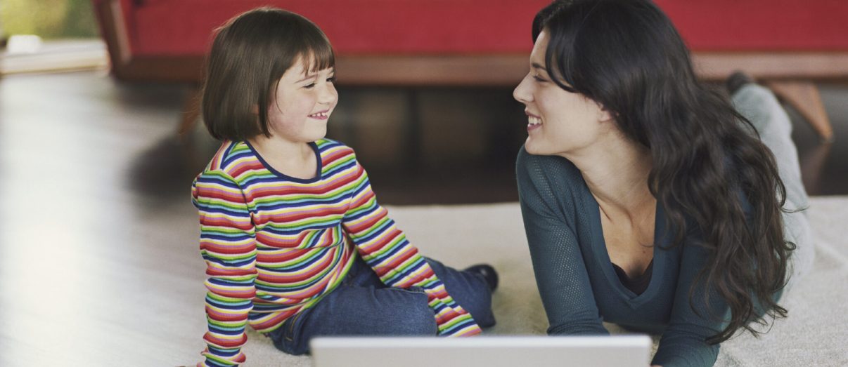 mom-with-child-and-laptop-2iStock_000020608236